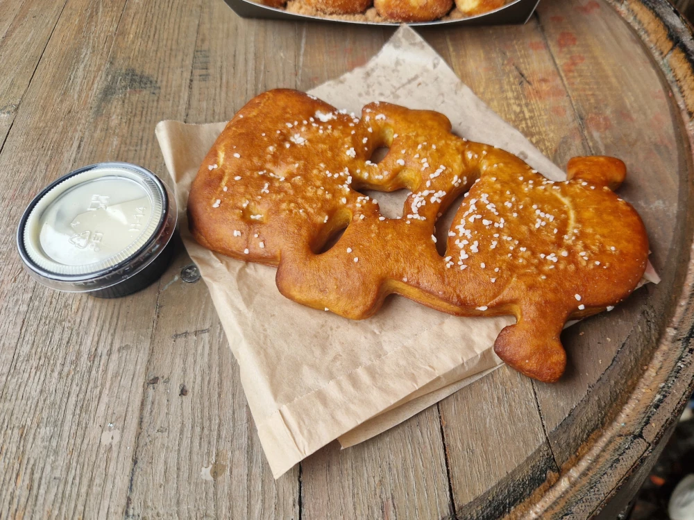 Epic Universe DeLaceys Cottage Frank and Friends Pretzel