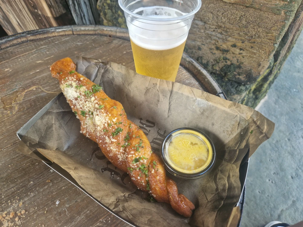 Epic Universe Burning Blade Tavern Hunters Garlic Stake Pretzel