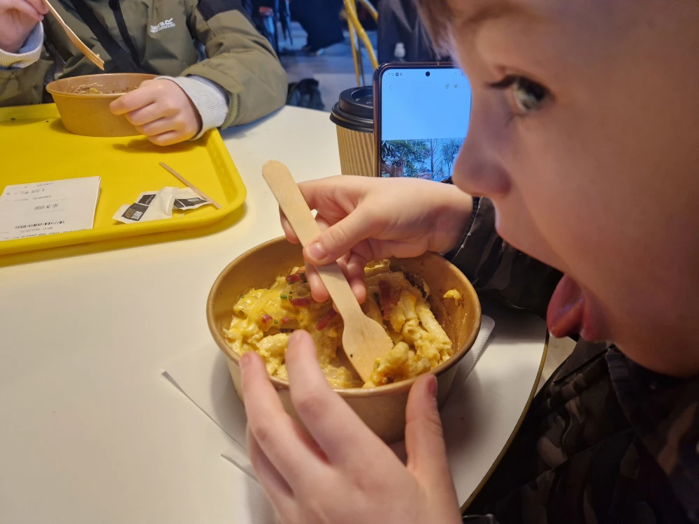 Paultons Park Eating Mac and Cheese